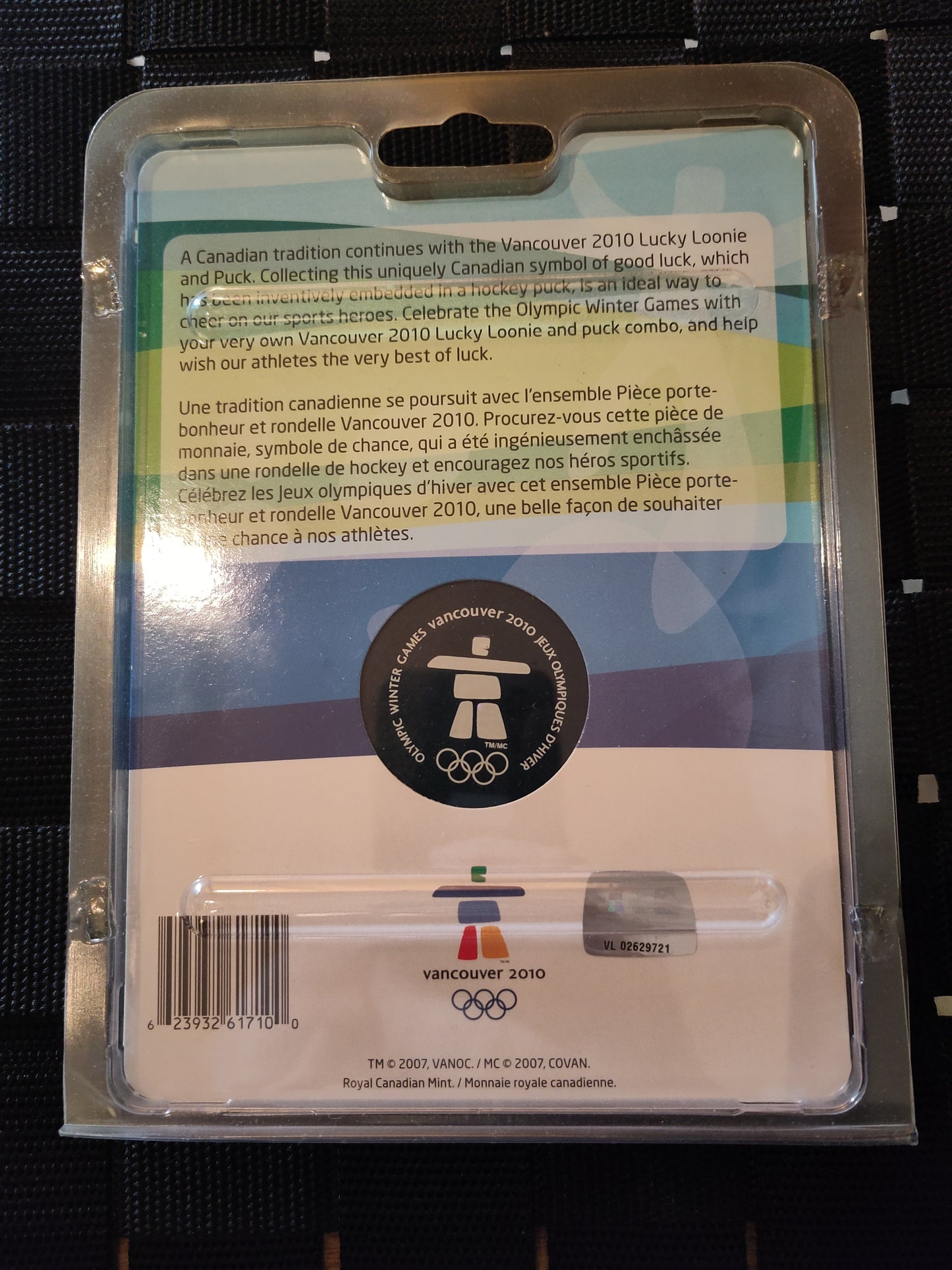 OL Vancouver 2010 puck med mynt