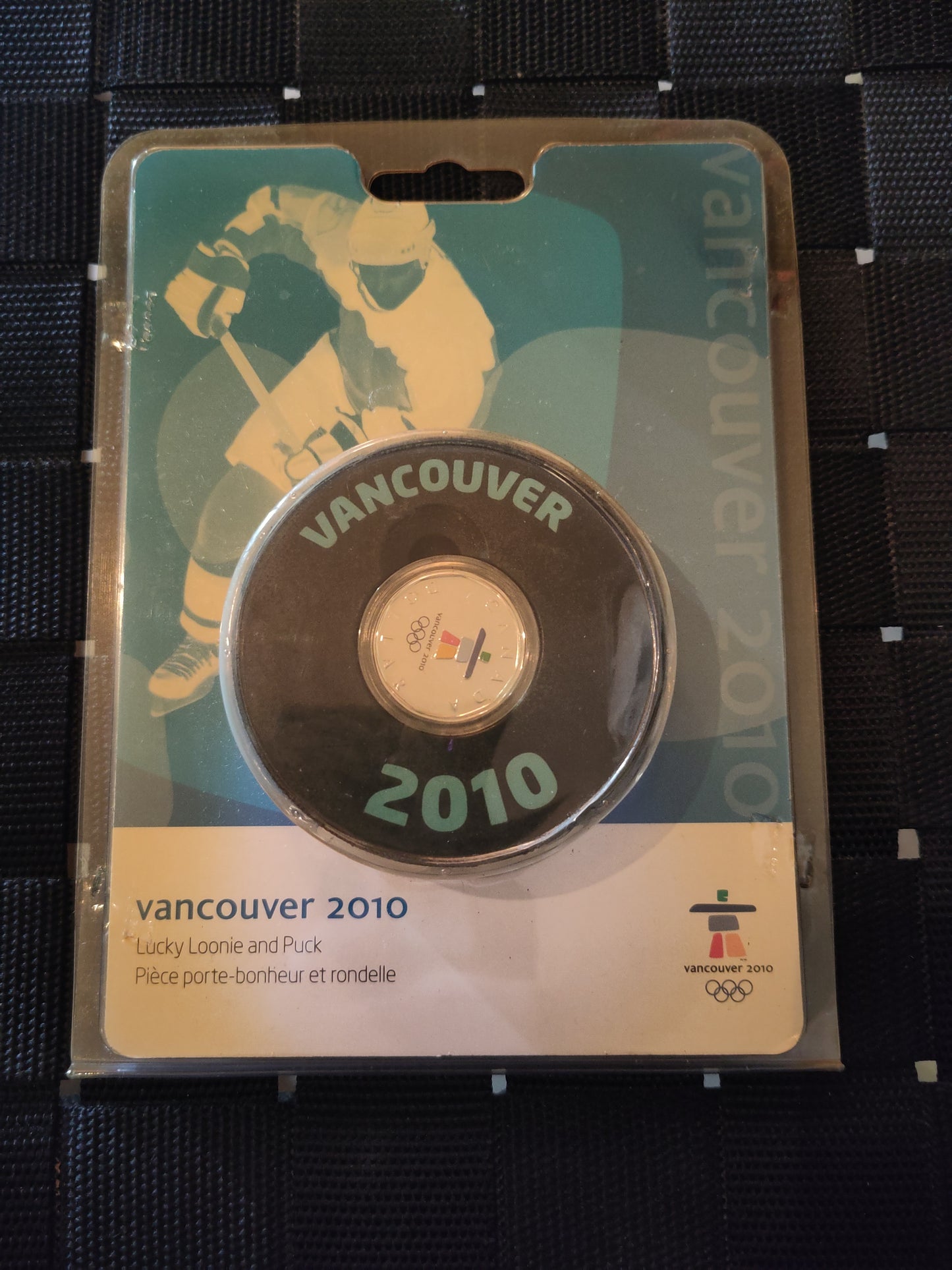 OL Vancouver 2010 puck med mynt